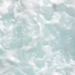 Image of foam and bubbles atop water