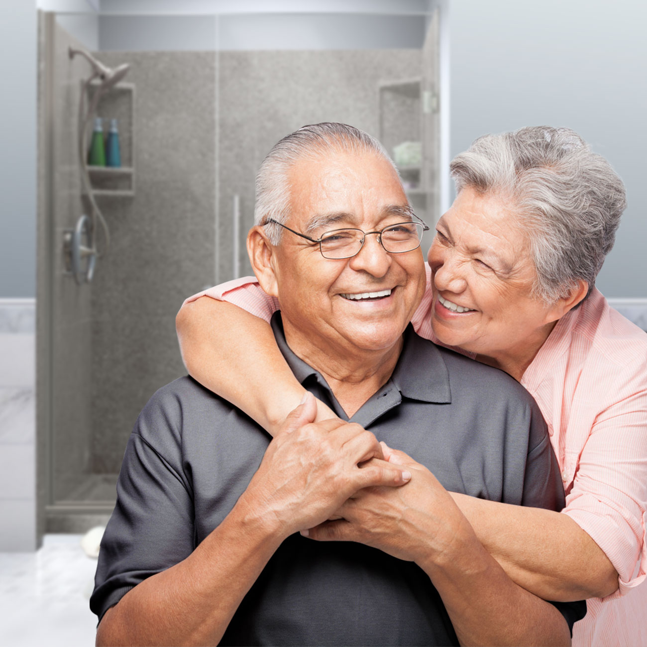 Couple smiling in front of walk in shower