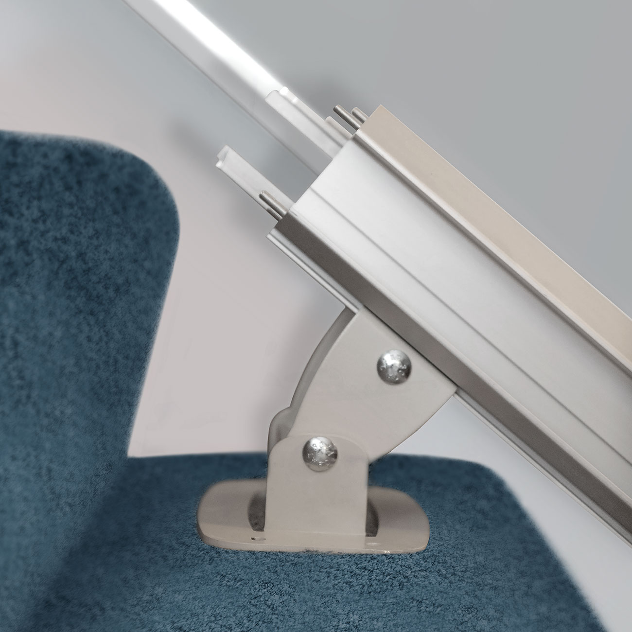 Photo of the rail installation of the stair-lift Solutions