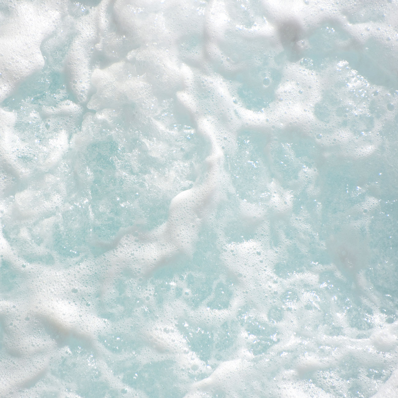 Image of foam and bubbles atop water