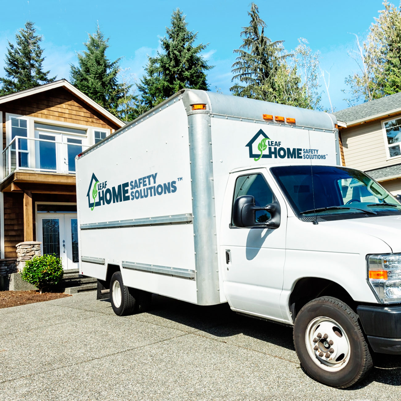 Leaf Home Safety Solutions delivery truck as it makes a delivery to resdential home
