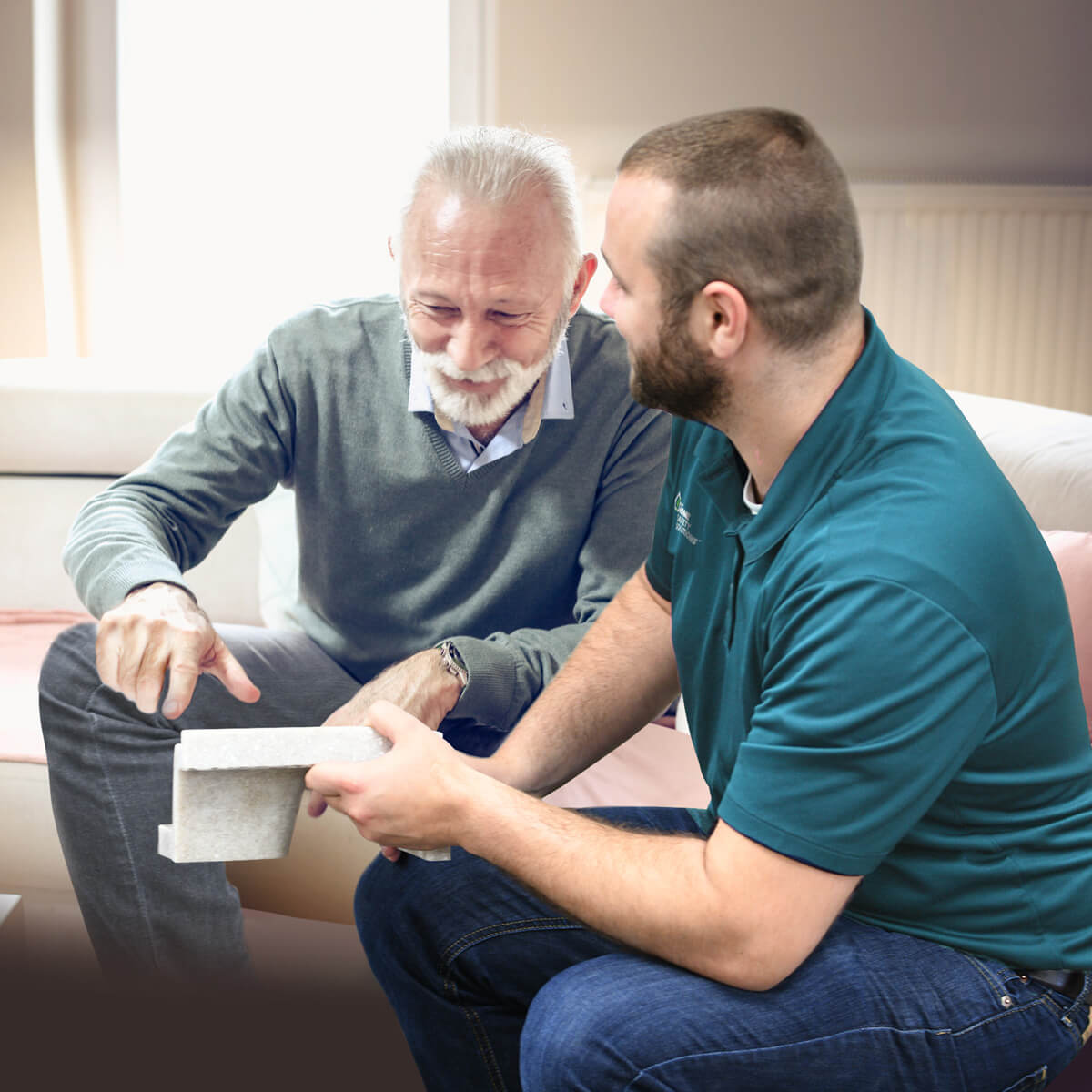 LHSS employee presenting to customer in their home